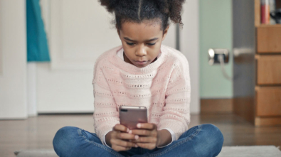 child playing with smartphone